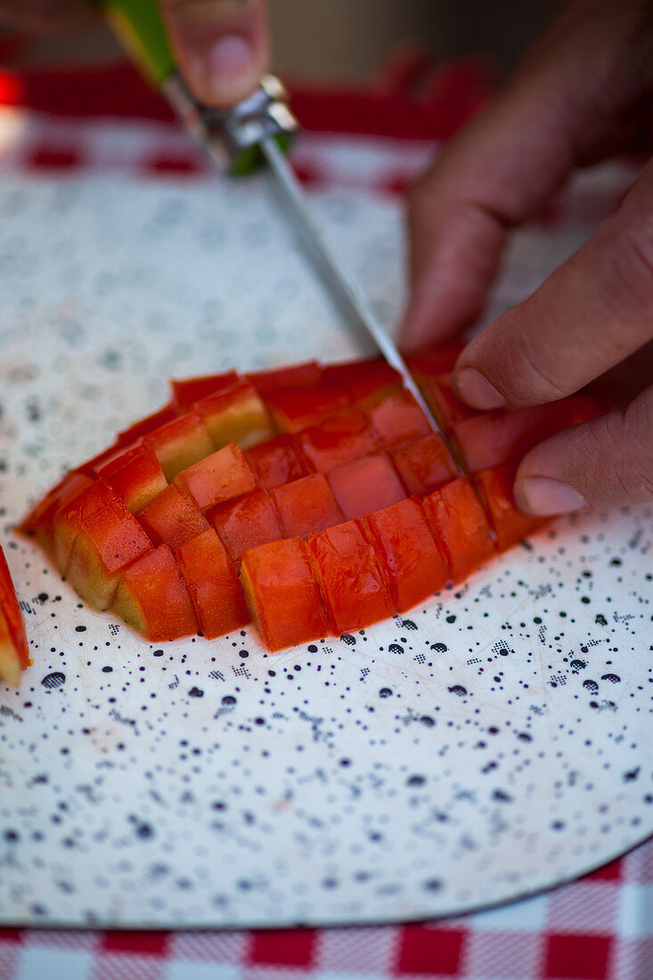 Tomatoes being sliced