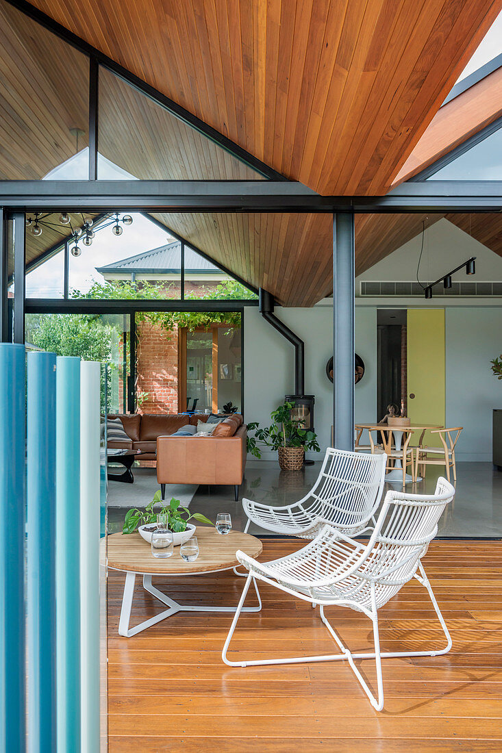 View of the covered terrace area and open living space under a pitched roof