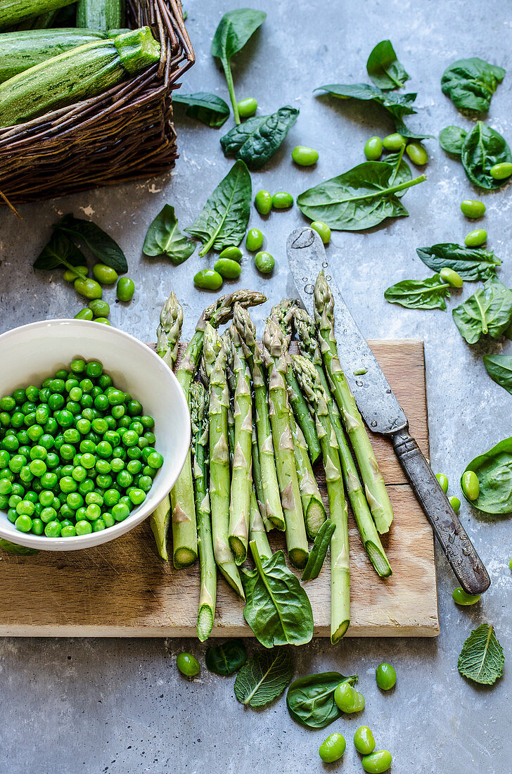 Still life with fresh green spring vegetables