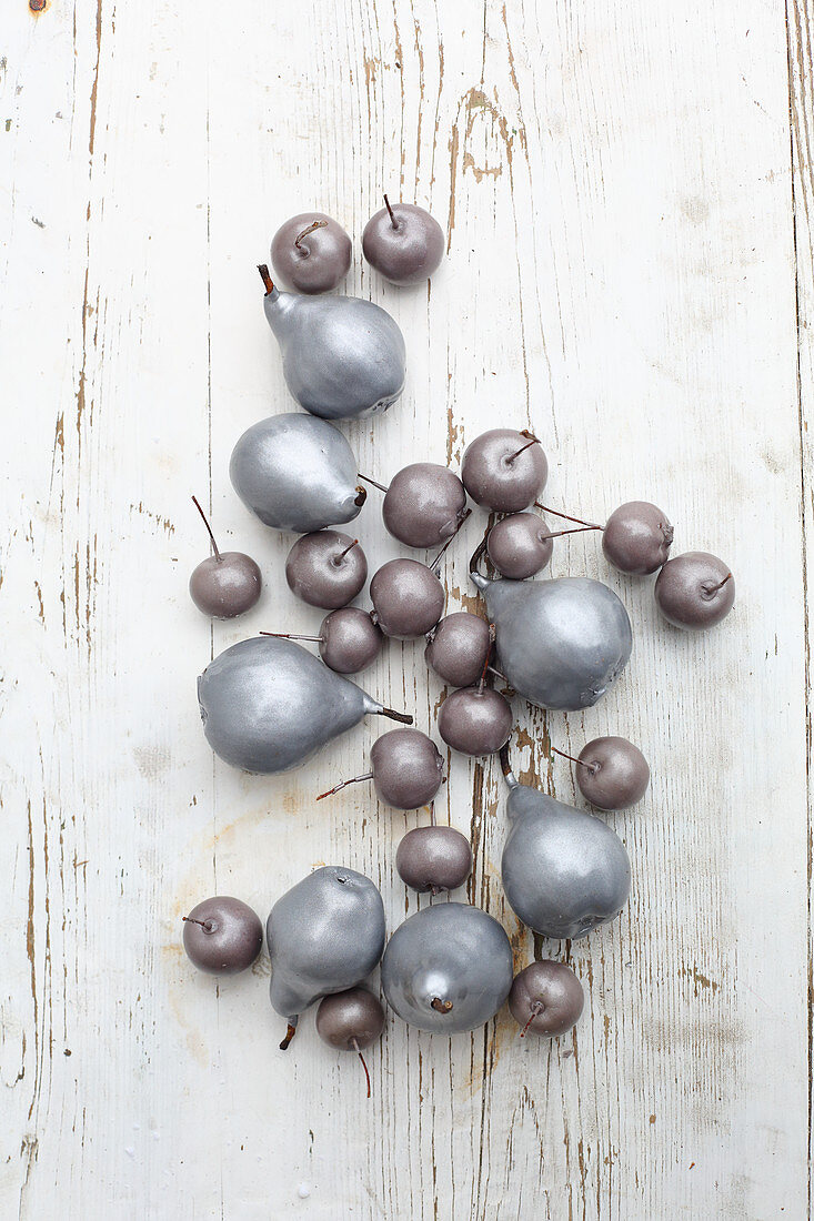 Pears and crab apples dipped in coloured wax