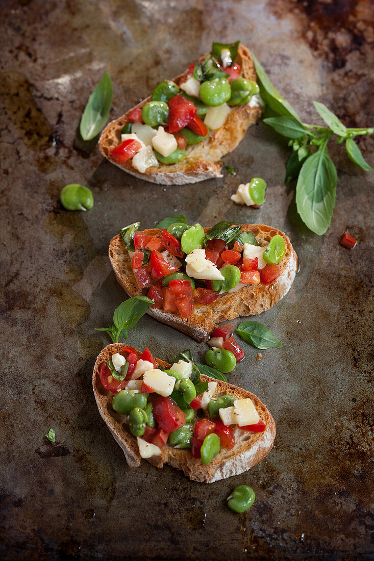 Crostini with tomatoes and fava beans