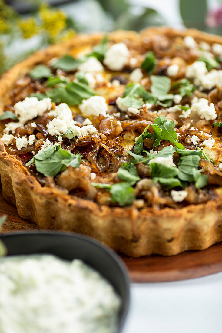 Roasted vegetable and feta quiche with caramelised red onion