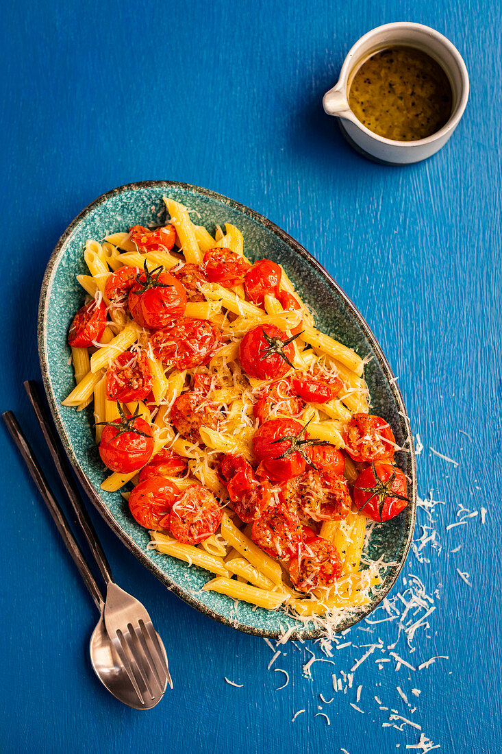 Penne with roasted tomatoes, pecorino and garlic hemp-seed oil