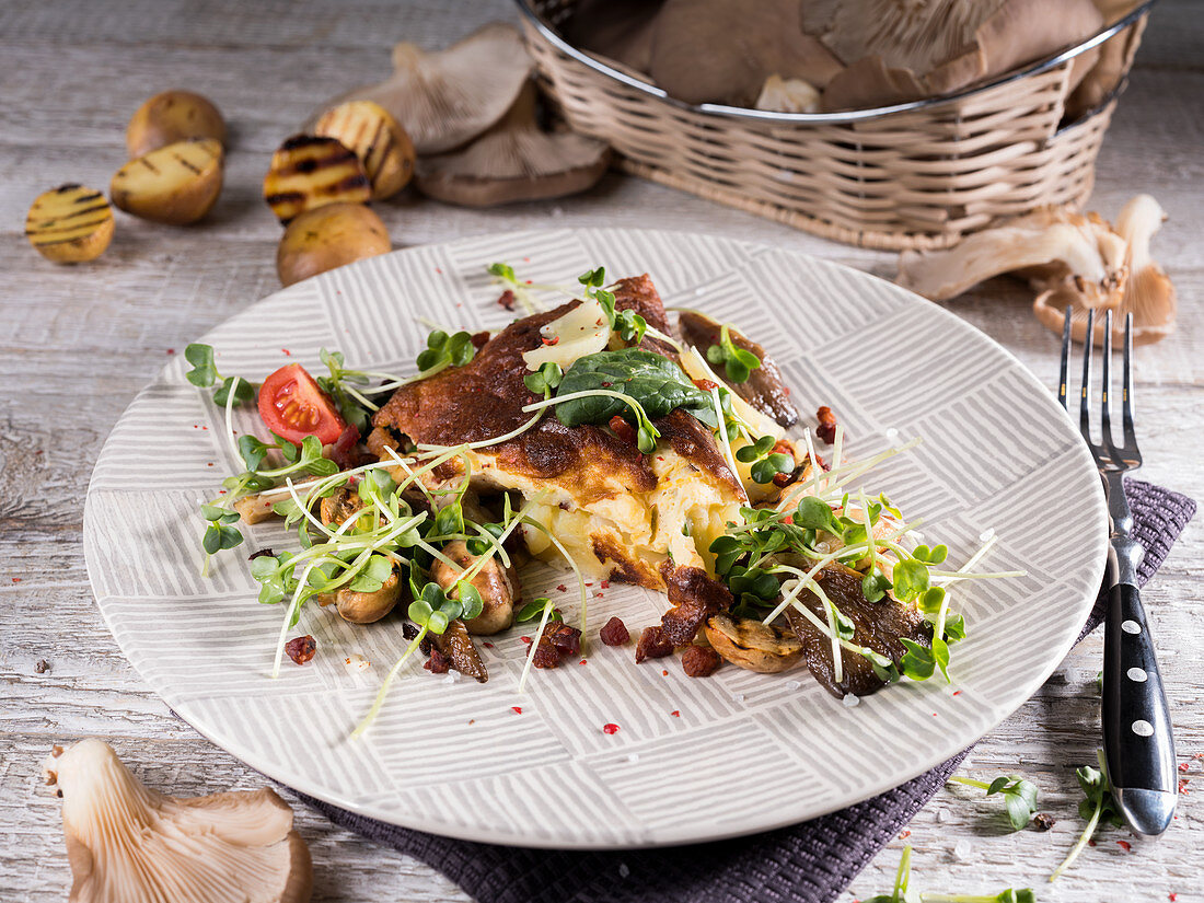 Spanish tortilla with cress, tomato, oyster mushrooms and grilled potatoes