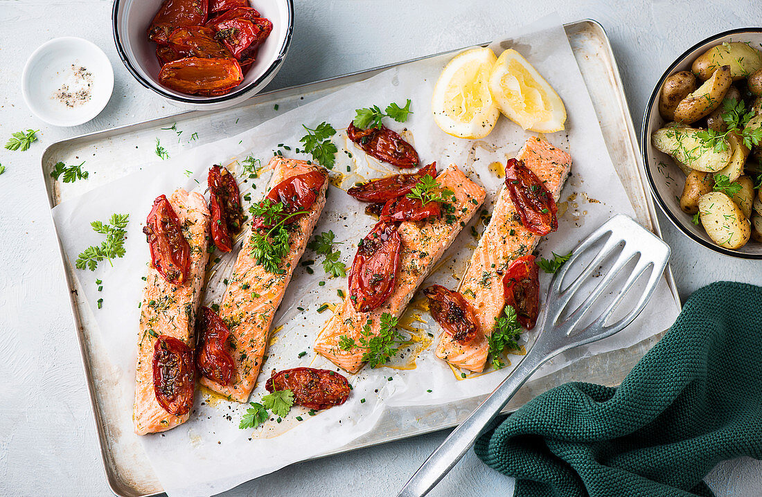 Salmon with dried tomatoes and potato salad