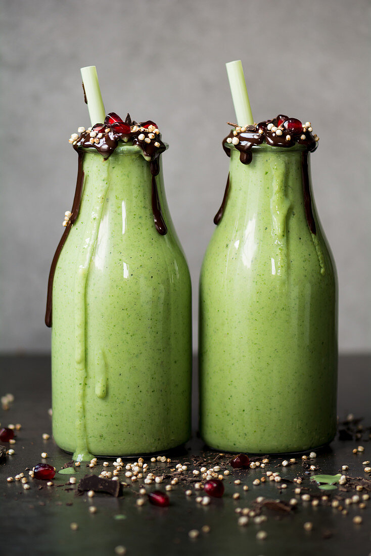 Green smoothies with pomegranate seeds