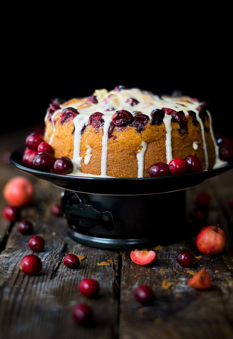 Apple pie with cranberries and icing