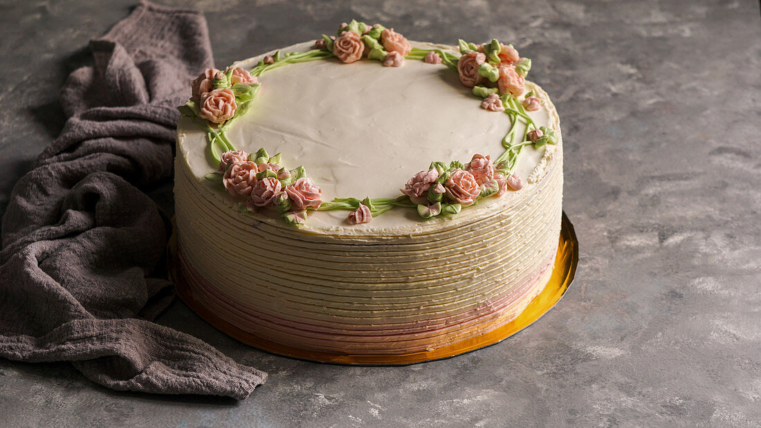 White cake with butter cream roses