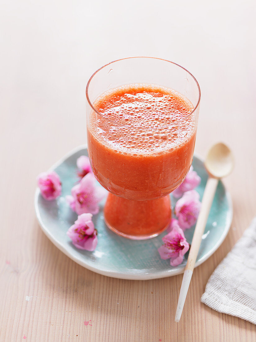 A spring smoothie made with strawberries and mandarins