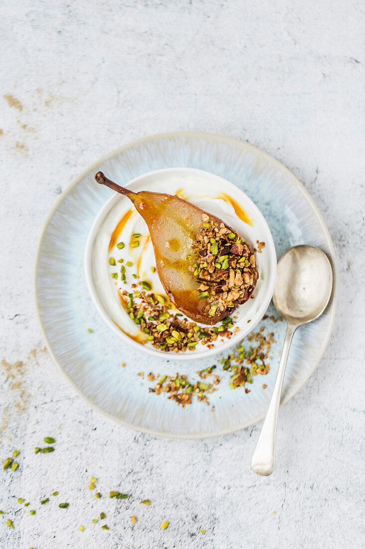 Pistachio granola with a baked vanilla pear