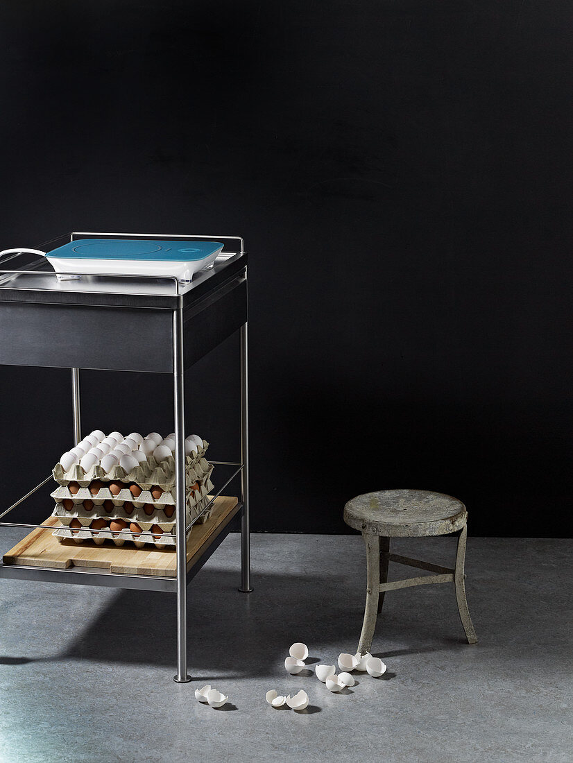 Kitchen furniture with eggs and a stove plate
