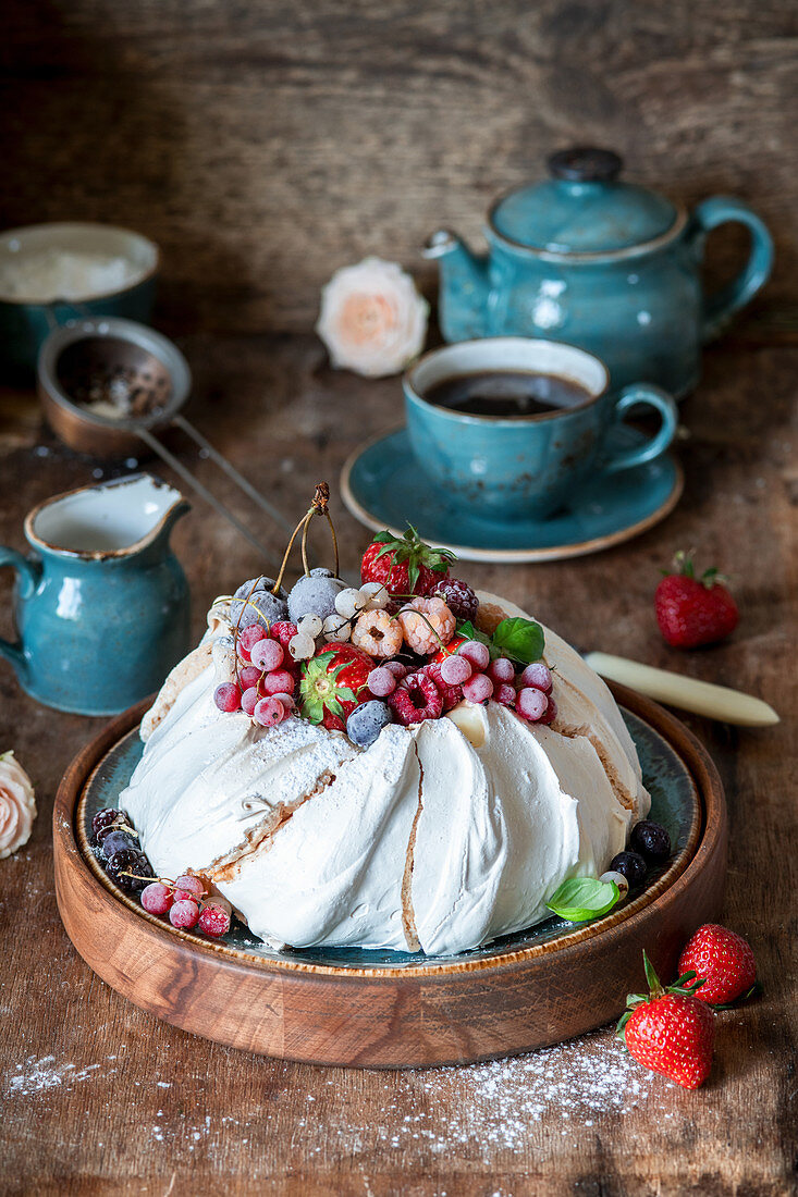Pavlova with fresh and frozen berries