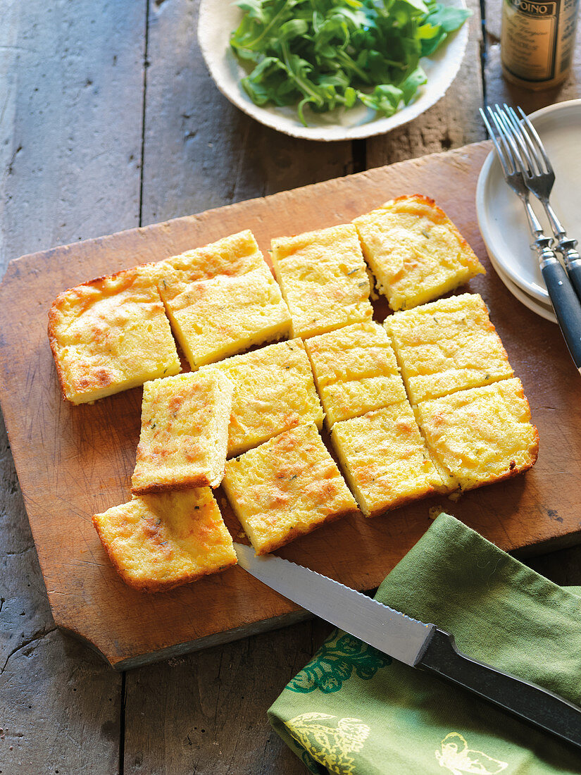 Corn cake slices with salad