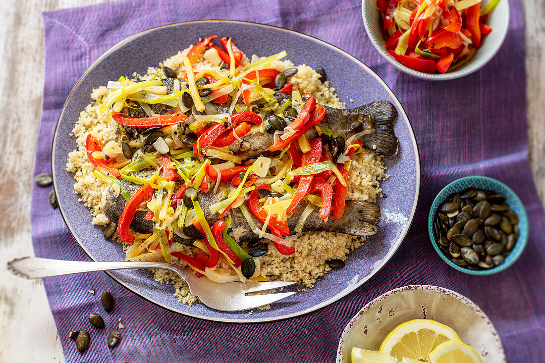 Trout with couscous, pepper and leek