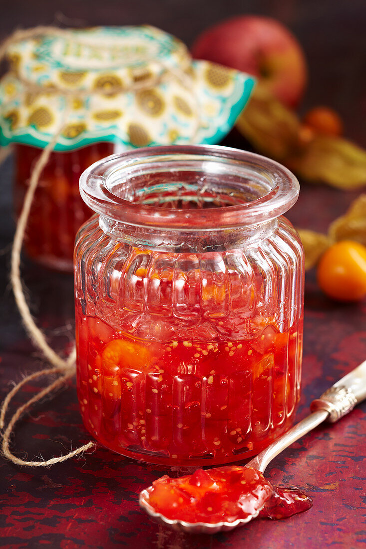 Homemade apple and physalis jam in a vintage jar