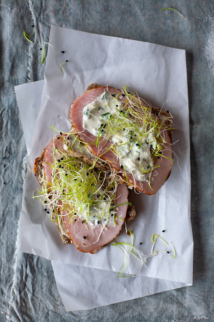 Ham sandwiches with cream cheese and sprouts