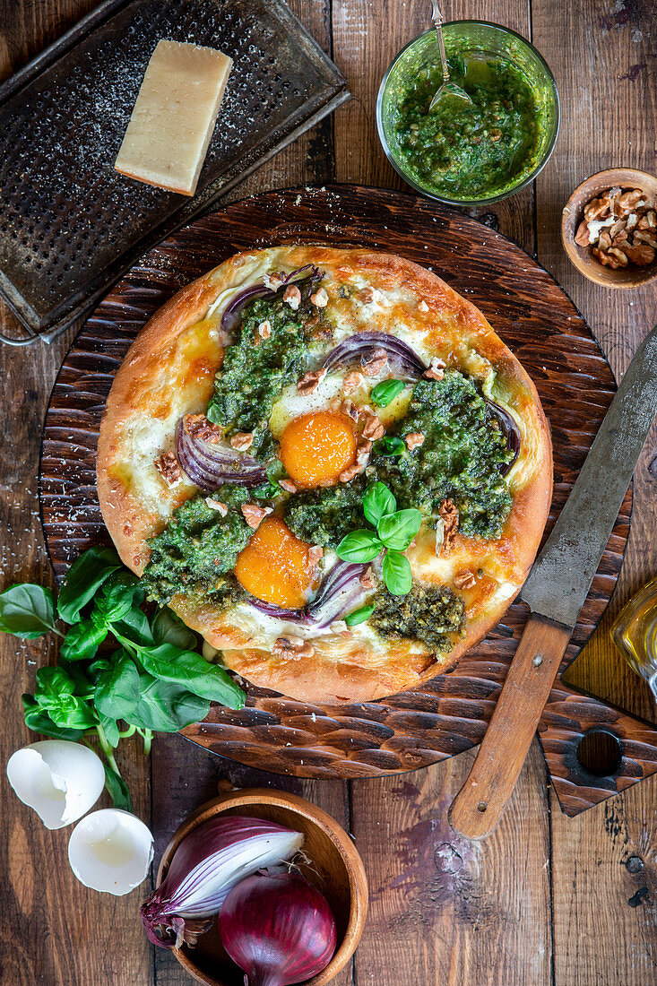 Veggie pizza with pesto and eggs