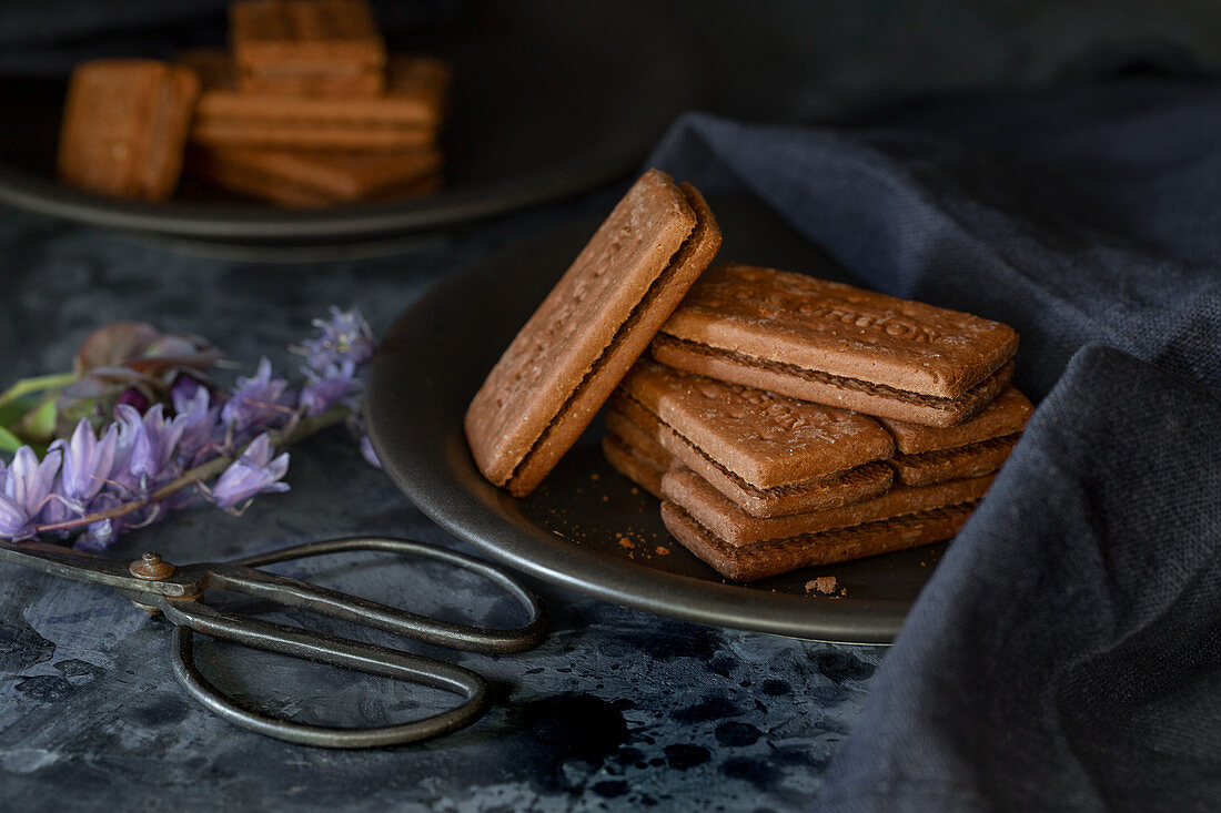 Bourbon biscuits on plates
