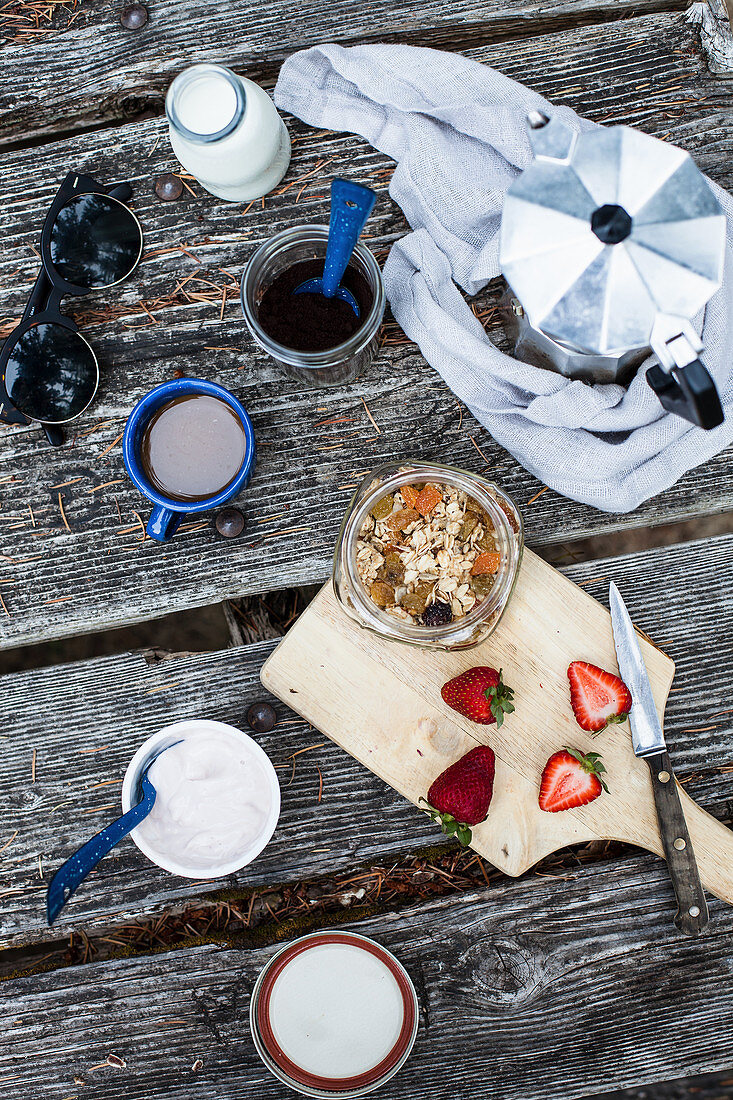 Breakfast on a wooden table outdoors