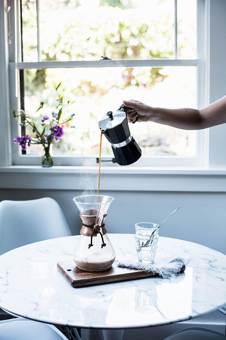 Coffee being made with a chemex coffee carafe