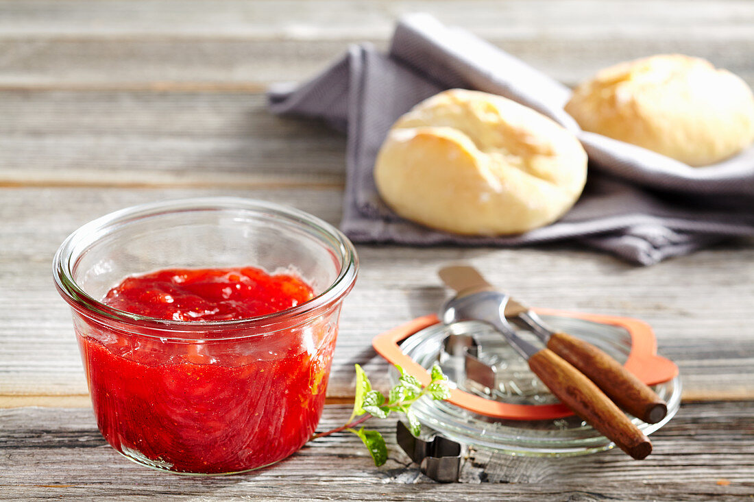 Strawberry and banana jam with bread rolls