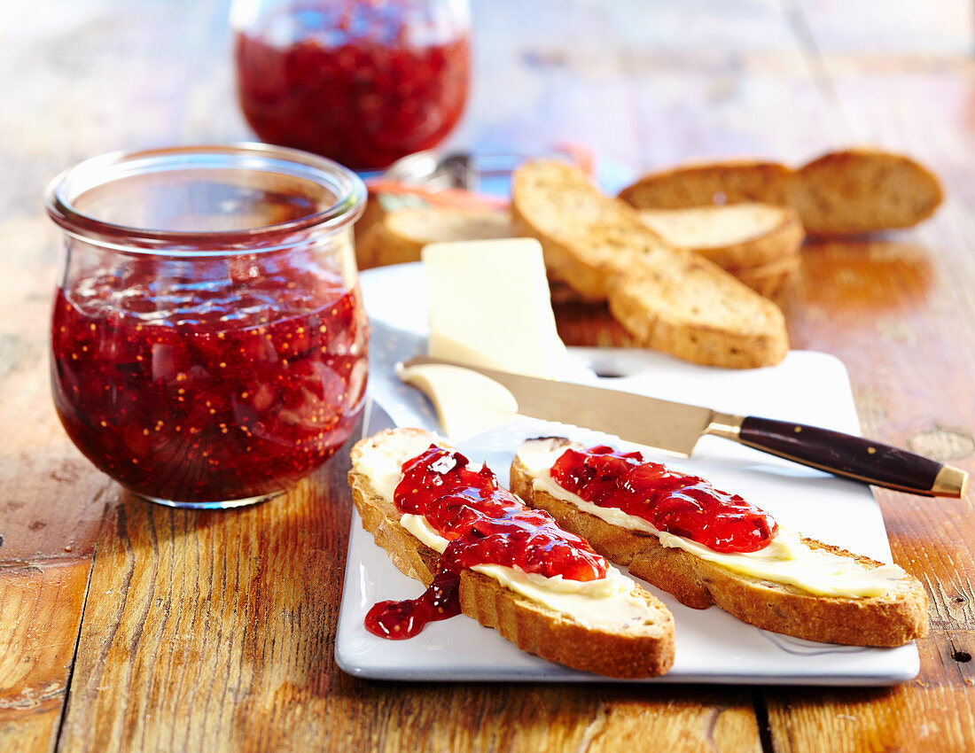 Homemade damson and fig jam on toast with butter