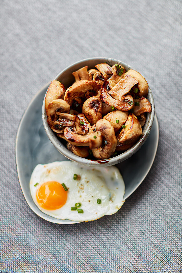 Fried mushrooms and a fried egg