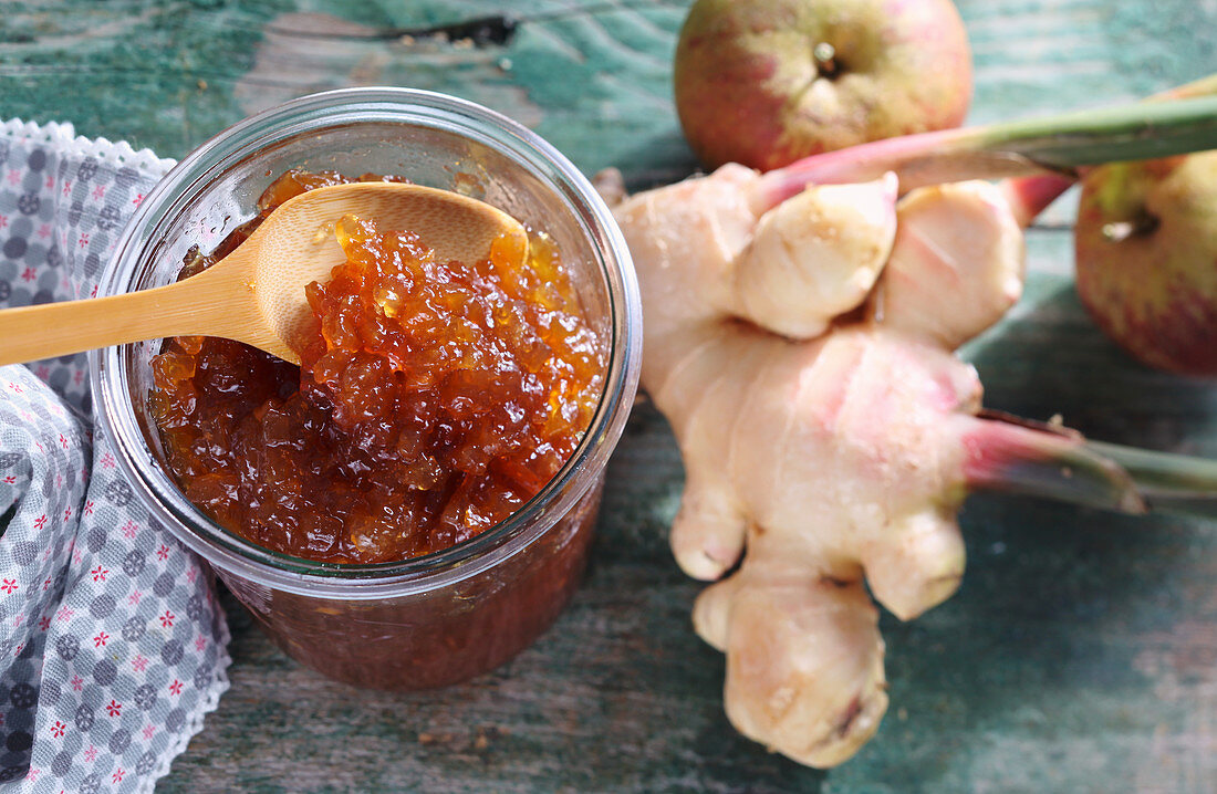 A jar of apple jam with ginger