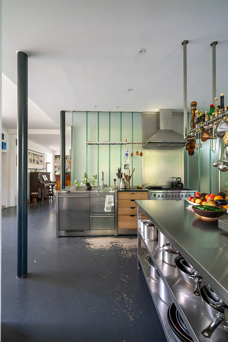 Island Counter With Stainless Steel License Image 12673643 Image   12673643 Island Counter With Stainless Steel Shelves Below In Open Plan Interior 