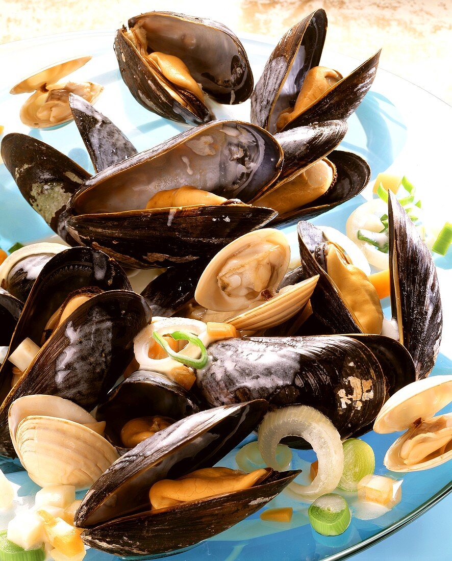 Mussels and clams cooked in white wine and vegetable stock