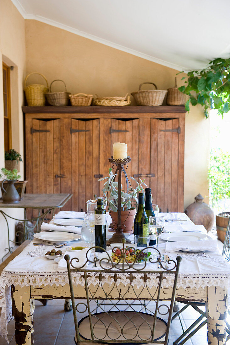 Set table on roofed veranda