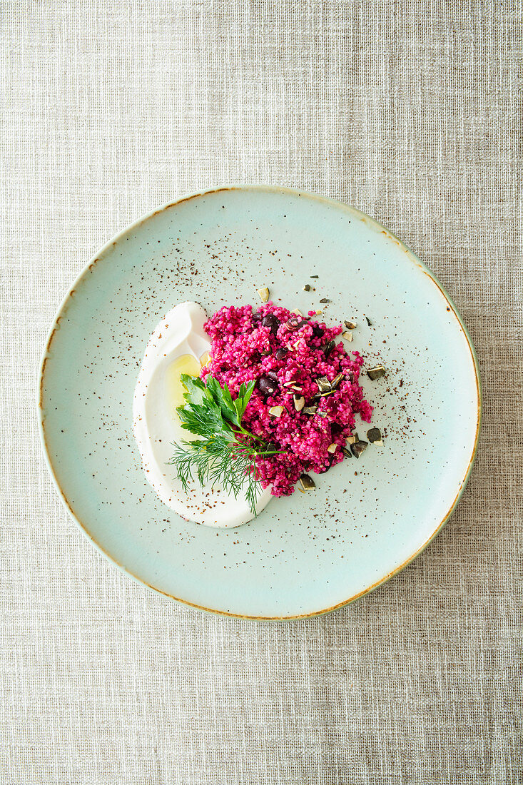 Couscous salad with beetroot, quinoa and sumach yoghurt (Levant cuisine)