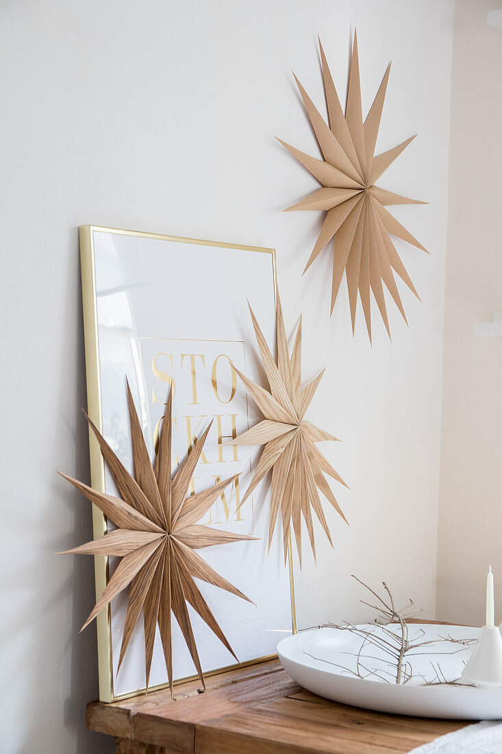 Christmas stars made from wood veneer decorating wall