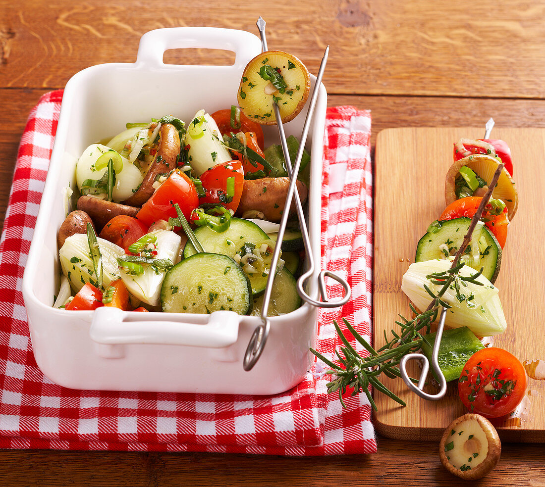 Vegetarian side dishes: grilled marinated vegetable kebabs with courgettes, shiitake mushrooms, pepper and herbs