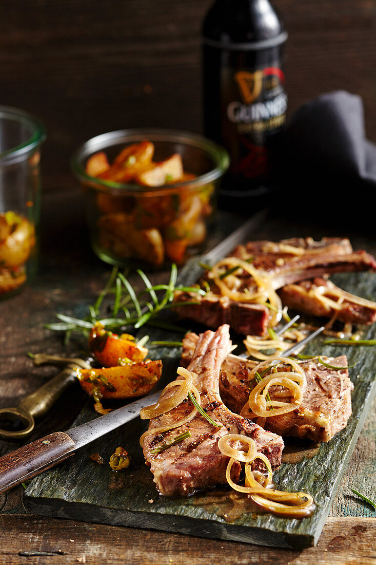 Grilled lamb chops in a beer marinade with potato wedges