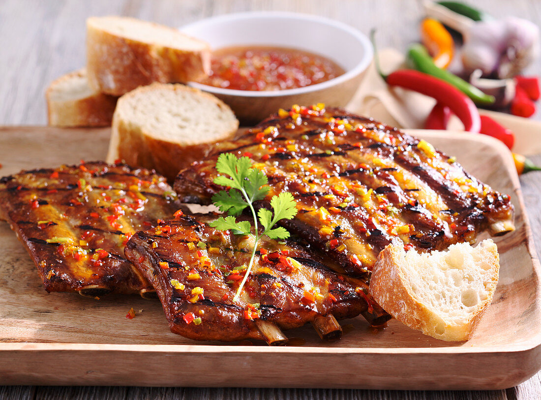 Grilled spicy spare ribs with a Caribbean marinade, coriander and white bread