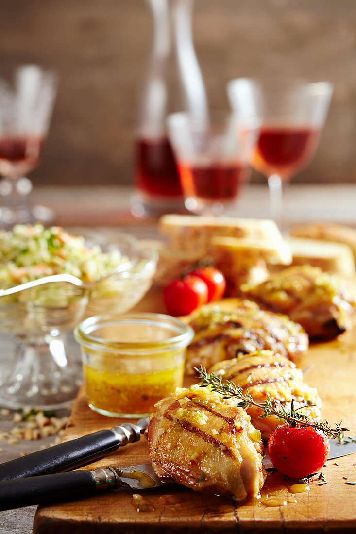 Grilled, marinated chicken legs with pineapple coleslaw