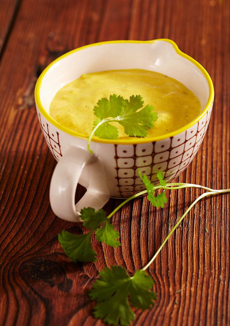 Exotic curried banana sauce with coriander for a fondue