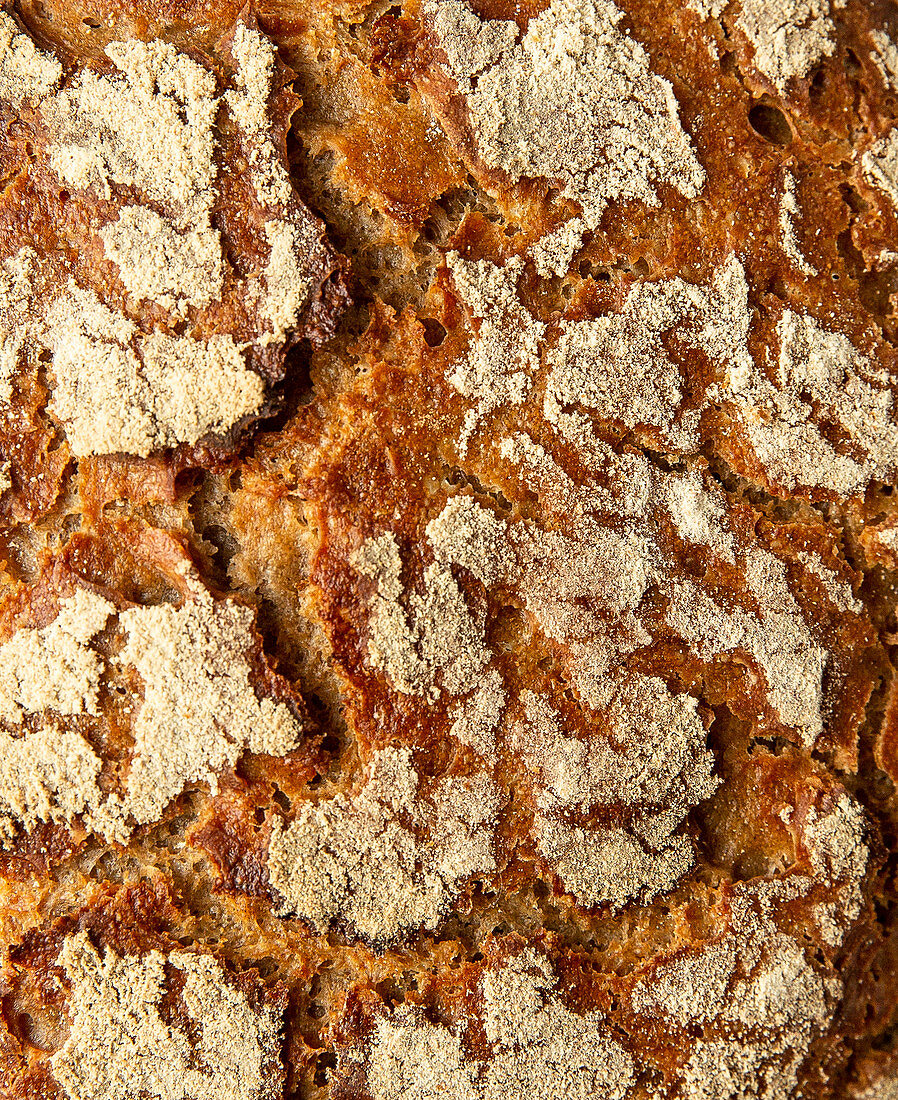 A crusty loaf of bread (close-up)