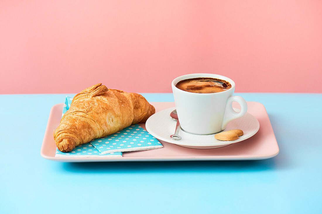 Lavazza black coffee and butter croissant.