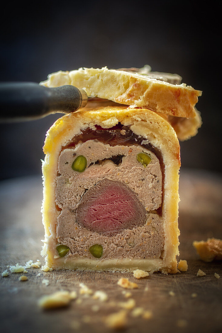Game meatloaf with fillet meat and pistachios, sliced