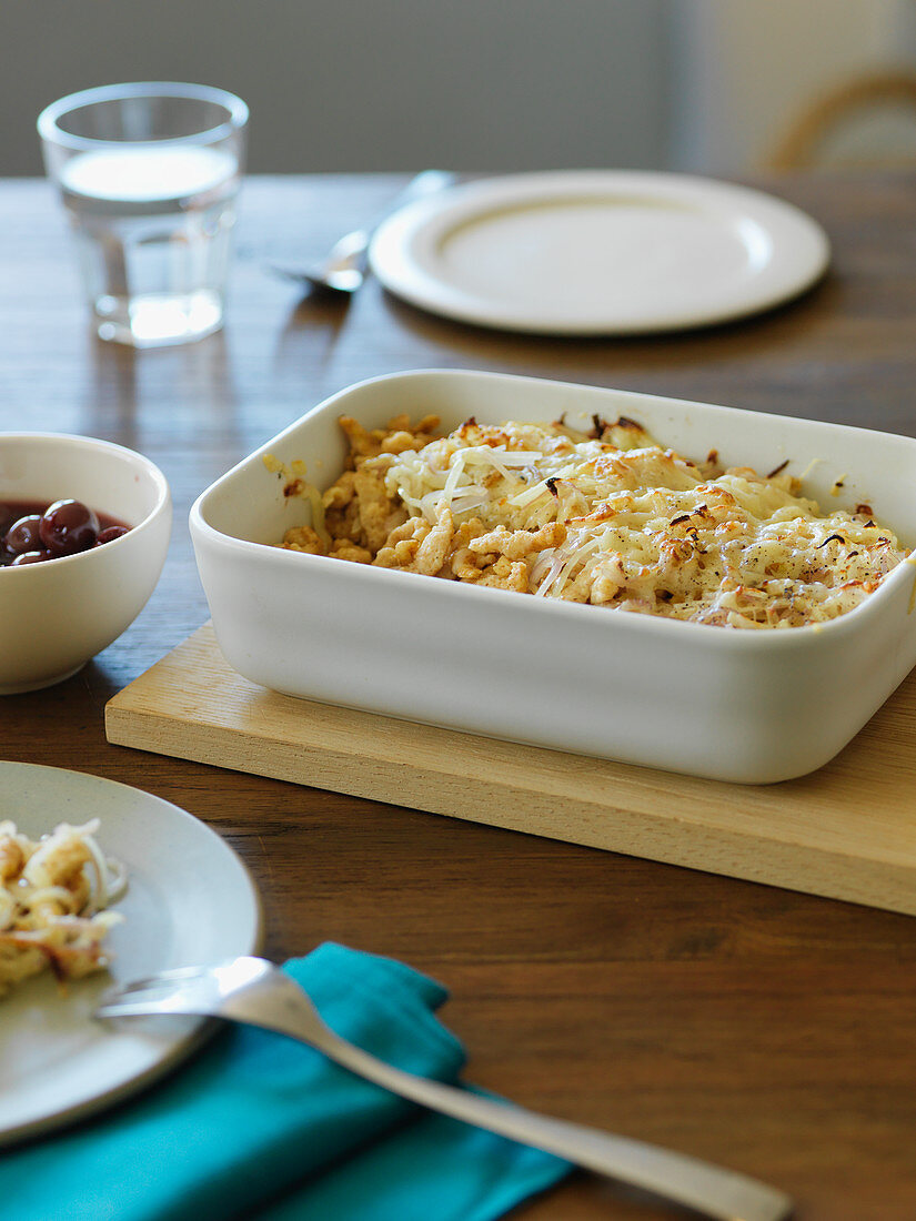 Quark spätzle pasta with cherry compote