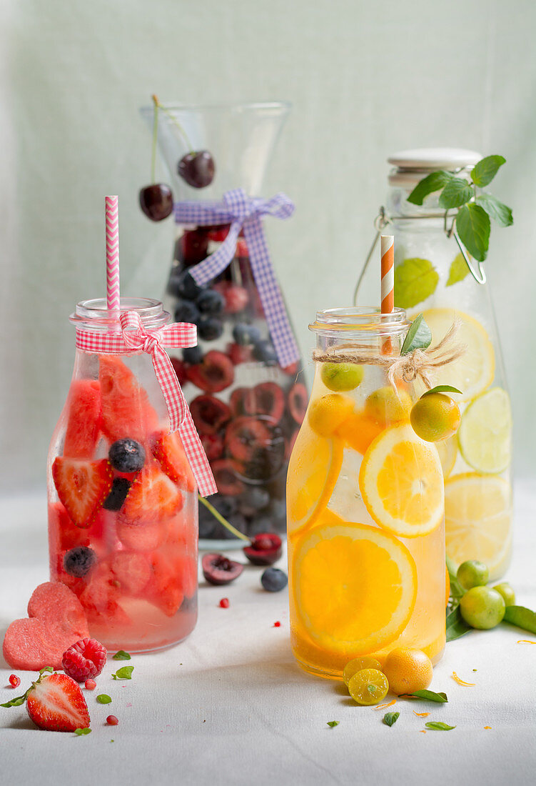 Flavoured water with cherries, berries, oranges and lemon