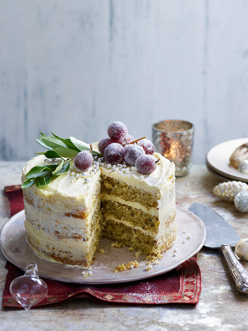 Pistachio and orange buttercream cake with candied grapes