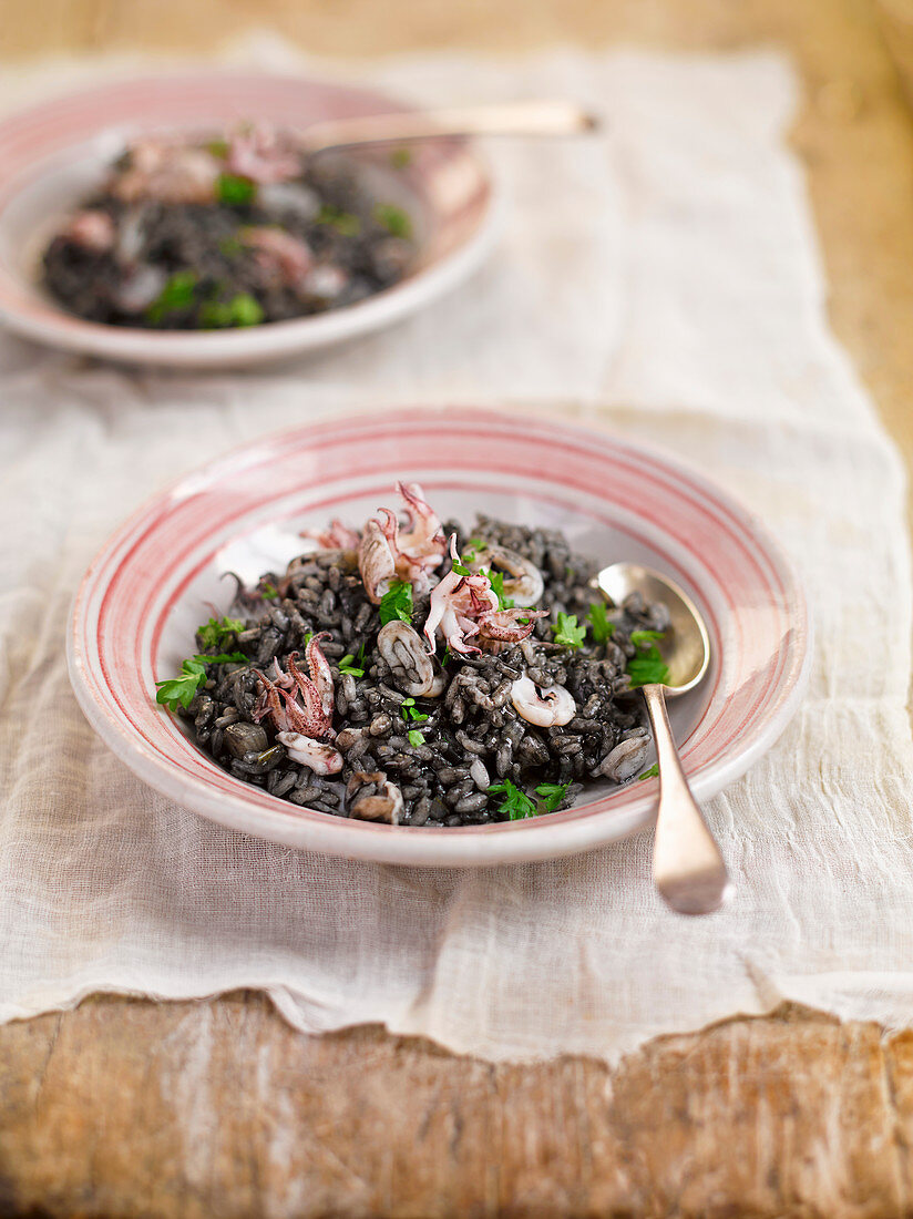 Risotto al nero di seppia (squid risotto, Italy)