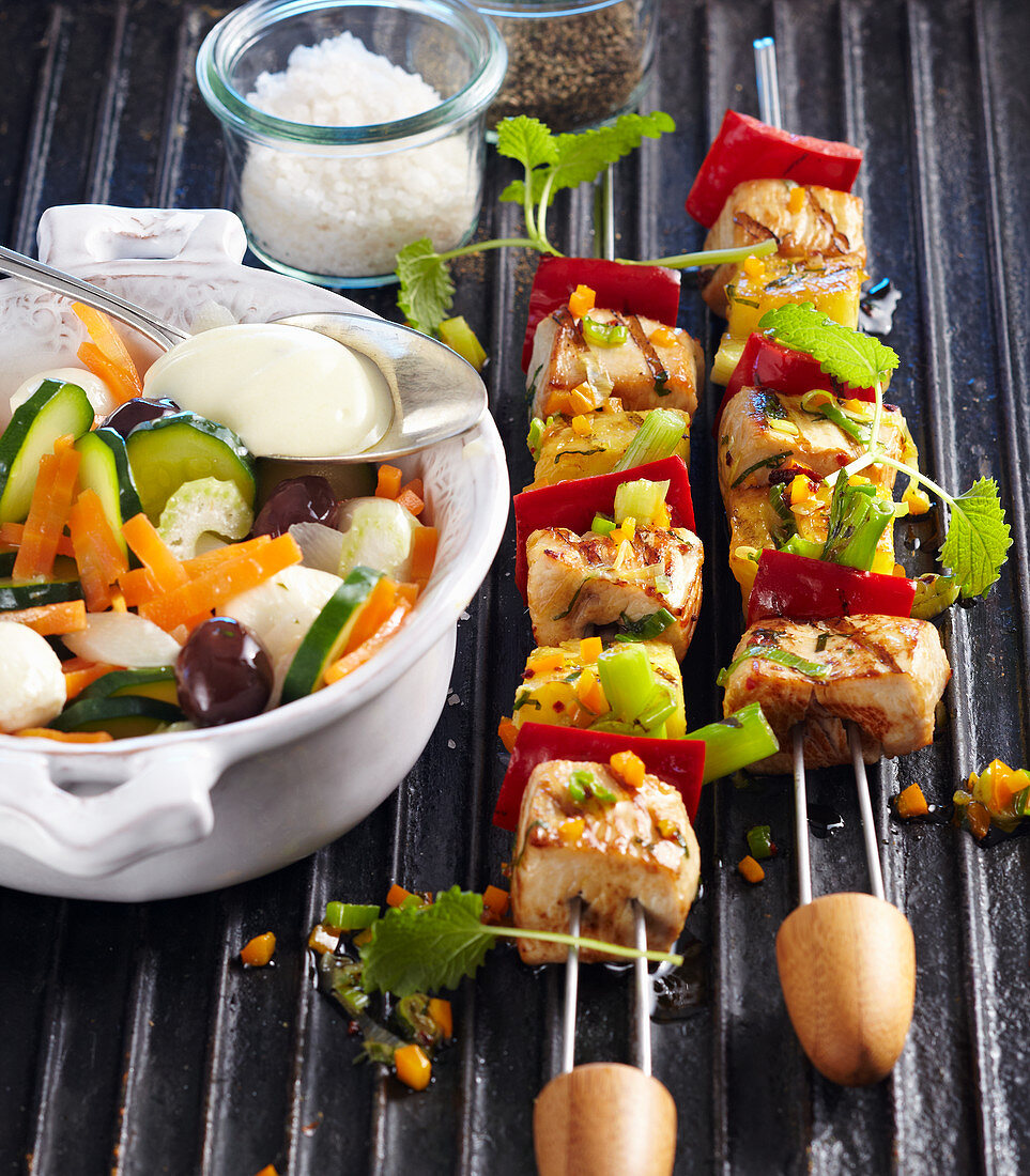 Grilled turkey skewers with a Carolina salad