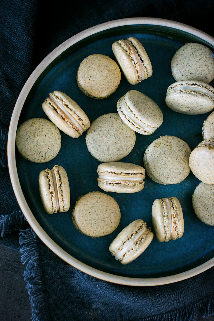 Macarons made of pumpkin flour with with chocolate ganache
