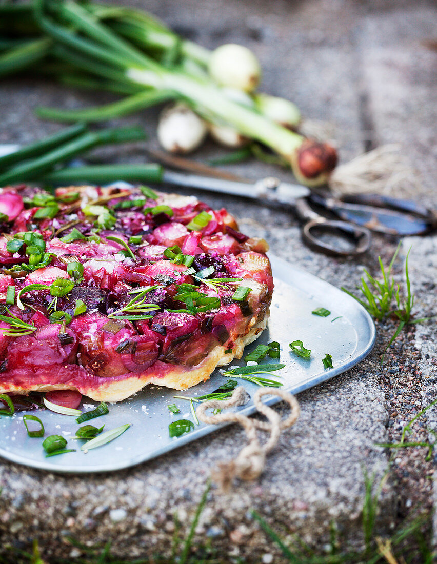 Vegetable cake with spring onion and beetroot