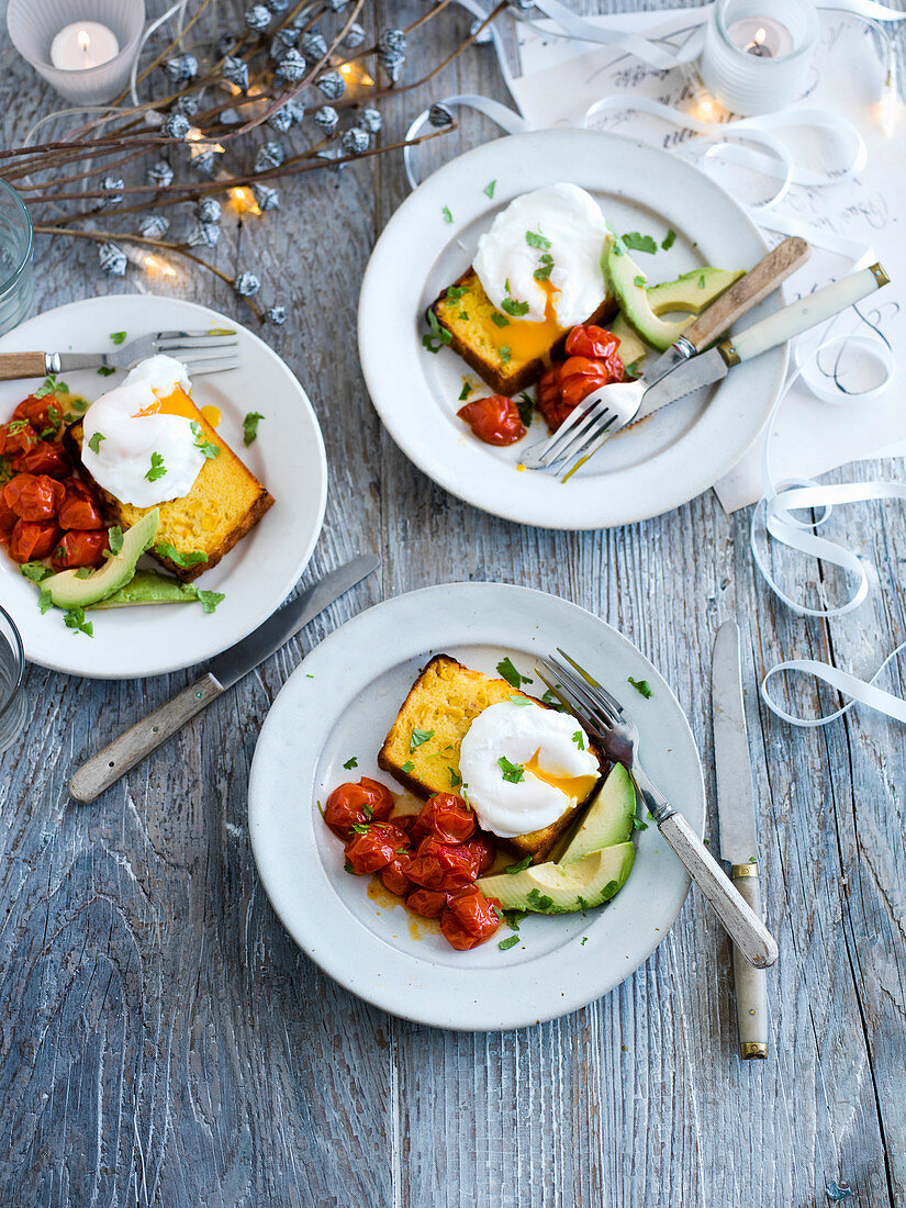 Cornbread with harissa-stewed tomatoes, avocado and poached eggs