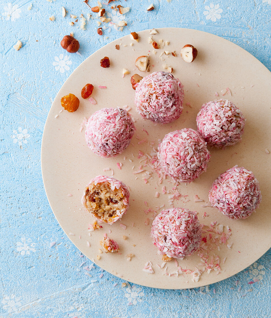 Energy balls with pink grated coconut